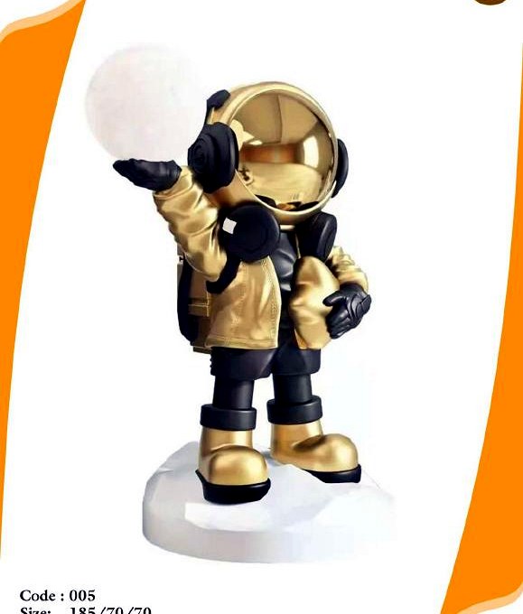Astronaut with moon lamp