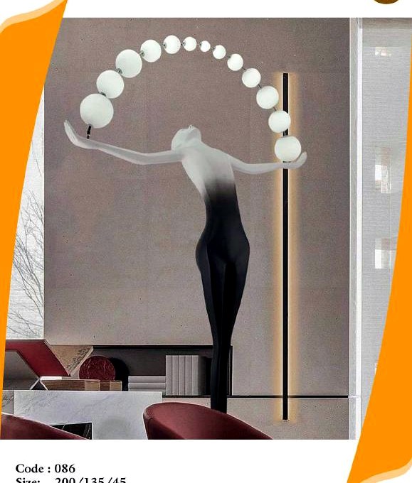 Dancer with arc of light spheres